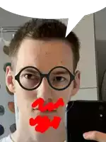 a man wearing glasses and a fake mustache takes a picture of himself