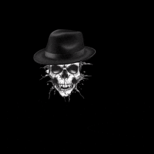 a logo for jj studios with a skull in a fedora hat