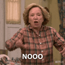 a woman in a plaid shirt is saying nooo in a netflix ad
