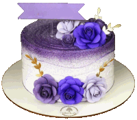 a white cake with purple roses and a purple banner on top