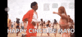 a man and a woman are dancing on a beach with the words `` happy cinco de mayo '' written above them .