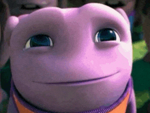 a close up of a purple cartoon character with blue eyes