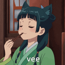 a girl with cat ears is eating with chopsticks and the word vee is on the bottom right