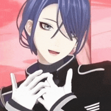 a boy with blue hair and white gloves is making a heart with his hands .