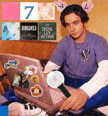 a man is sitting in front of a laptop with stickers on it including one that says hope world