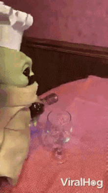 Pouring Wine Baby Yoda GIF - Pouring Wine Baby Yoda Viralhog GIFs
