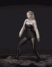 a woman in a white shirt and black shorts is standing in the dark
