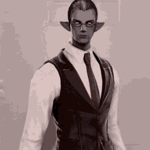 a man in a suit and tie is standing in front of a wall