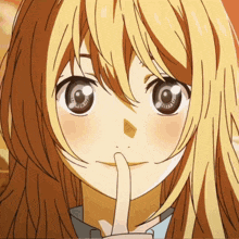 a blonde anime girl with a finger on her lips