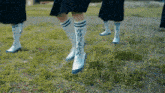a person wearing a pair of white socks with chinese characters on them