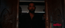 a group of men are standing in a hallway with the word brothers written on the bottom