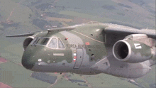 a military plane with the word força aerea written on the side