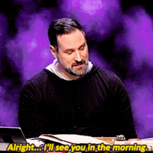 a man with a beard says " alright i 'll see you in the morning " in front of a purple background