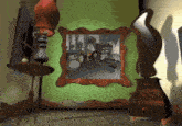 a picture of a group of cartoon characters in a room with a green wall