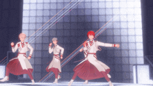a group of anime characters are dancing on a stage in front of a checkered wall