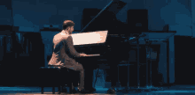 Playing Piano Performance GIF - Playing Piano Performance Stage GIFs