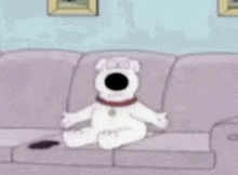a cartoon dog is sitting on a purple couch .