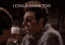a man drinking a glass of beer with the words " i could drink too " behind him