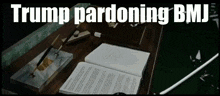 a picture of a desk with the words trump pardoning bmj written on it