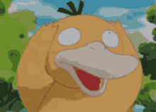 a close up of a yellow duck with its mouth open .