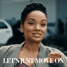 a woman says " let 's just move on " in front of a car