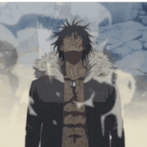 a man with a fur collar is standing in front of a wall