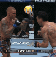 a boxing match between holloway and poirier is being shown on tv