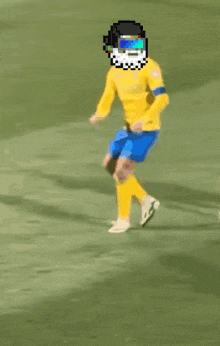 a pixelated soccer player wearing a yellow shirt and blue shorts