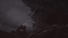 a dark background with a few glowing lights in it