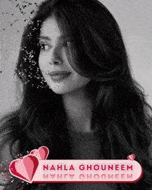 a black and white photo of nahla ghouneem with hearts around her