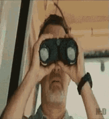 Tom Hanks Binoculars GIF - Tom Hanks Binoculars Kim Jong Un GIFs