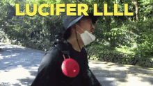 a man wearing a mask and a hat with the words lucifer lll on the top