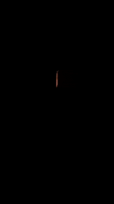 a blurry picture of a woman 's face is being projected on a wall