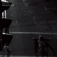 a man is laying on the ground with the words made with reface app on the bottom right