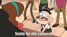 a cartoon character says smile for the camera in front of a group of people