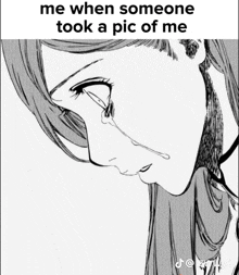 a black and white drawing of a woman crying with a caption that says me when someone took a pic of me