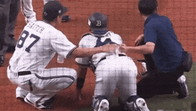 a baseball player with the number 87 on his back