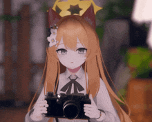 a girl with cat ears is holding a camera in her hands