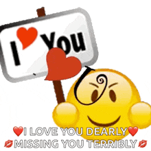 a smiley face is holding a sign that says " i love you dearly missing you terribly "
