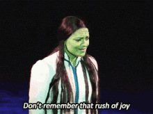 a woman in a green mask says don 't remember that rush of joy