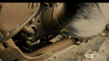 a close up of a motorcycle engine with the letters amc visible