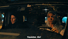 two women in a car with yasmine go written on the screen