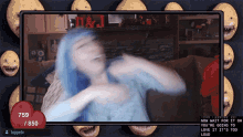 a screen shows a woman with blue hair and 759 / 850