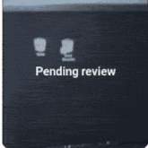 a computer monitor with the word pending review on it