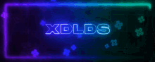 a neon sign that says xdlds in white letters