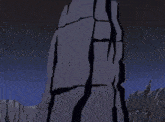 a green beam is coming out of a gray object .