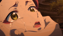 a close up of a woman 's face with tears running down her cheeks