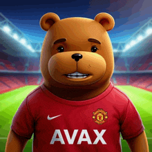 a teddy bear wearing a manchester united jersey