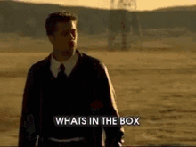 Whats In The Box Smoking GIF - Whats In The Box Smoking I Dont Know GIFs