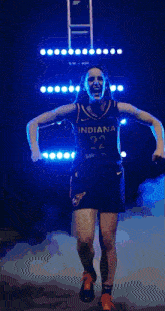 a female basketball player wearing a jersey that says indiana 22 on it